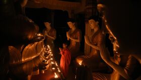 Little Buddhist Monk praying inside the Pagoda, Thailand